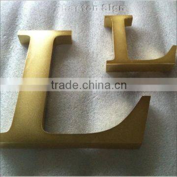 beautiful golden plated metal letters signage