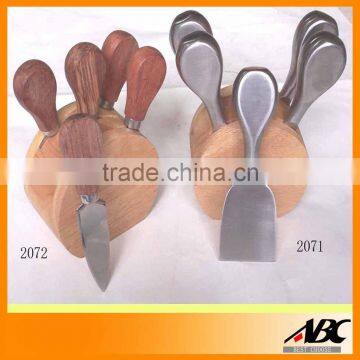 stainless steel cheese tool with wooden holder