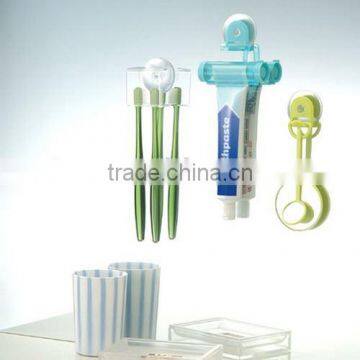 Fashionable toothpaste partner squeezer and dentifrice extruder