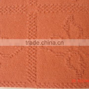 Single color velour jacquard nonwoven carpet