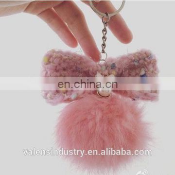 Hot Sell OEM Customized fluffy faux fur pom pom ball Keychain pom poms Pendant for woman cellphone/handbag/hats/Car