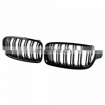 Двойные передние килевые флюги для решетки радиатора BMW F30. Цвет решетки радиатора - глянцевый черный. Решетка радиатора для BMW F30, F31 с 2012 года выпуска, 3-й серии: 320i, 328i, 335i, 335i photo-6