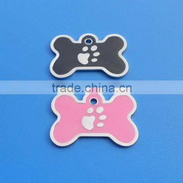 soft enamel customized two paws logo bone shape pet name tags