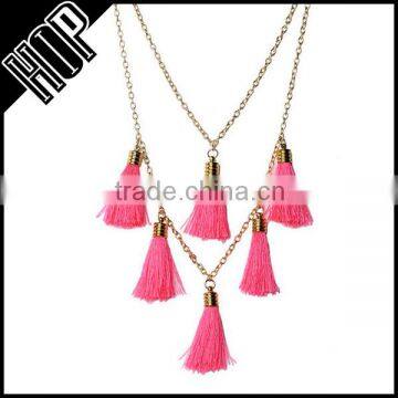 Best selling fashion metal gold plated cloth red tassel pendant