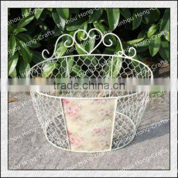 Oval shape pink rose designed outdoor decorative wall wrought iron planter stand/metal plant pot holder/wholesale garden decor