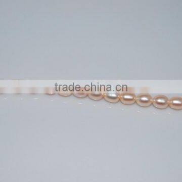 new 8-9mm pink rice shape freshwater pearl strand wholesale