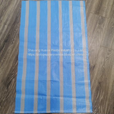 White recyclable woven polypropylene sand bags with drawstring on the side