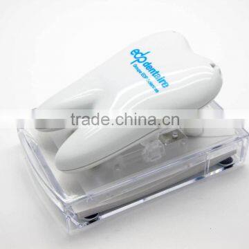 TOOTH SHAPE NOTES DISPENSER