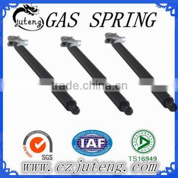 Rigid locking gas spring for medical beds