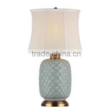 Hungry gold metal base pineapple table lamp with light cyan china lampstand for hotel guest room decoration