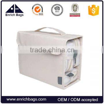 Enrich wholesale portable traveling waterproof cosmetic bag with removable pockets