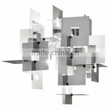 0815-9 laser-cut stainless steel frames create dynamic element to any space Untitled Wall Light