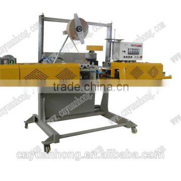 2014 China sell YHS adhesive tape automatic filling bag sealing machine