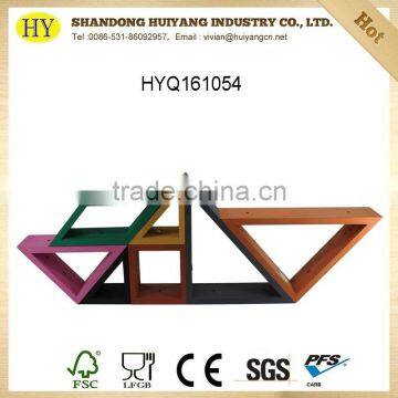 Tangram Shape Wooden Display Rack Against Wall photo-3