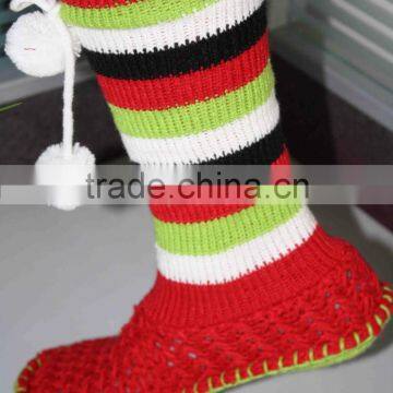 Thick knitted woman socks with pompoms