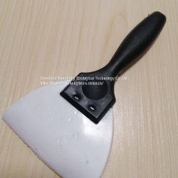 Clean use of car paint  Rubber putty scraper