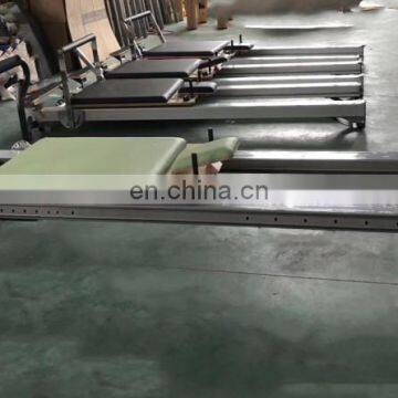 Лечебный комплекс оборудования. Индийский полу-трапециевидный столик, алюминиевская кровать с башней. Продается в Мельбурне. Прибор для пилатес-реформера photo-3