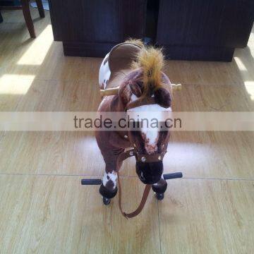 2016 interesting gift mechanical horse toys on wheels