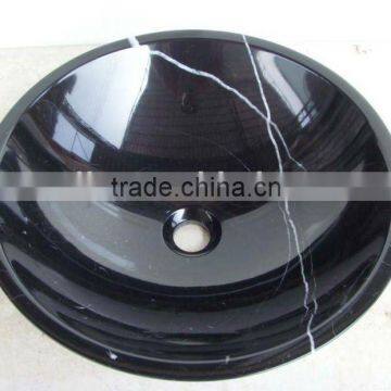 black marble stone sink