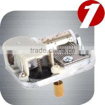 On Off Rotary Switch Underneath Mechanical Mini Clockwork Music Box Movement