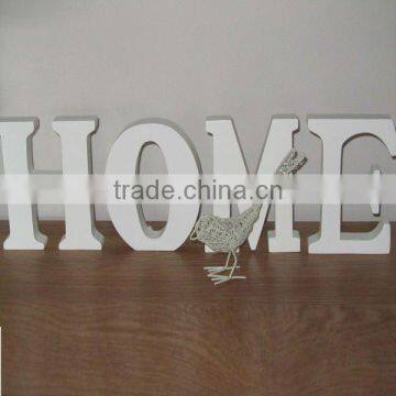 white home wooden letter