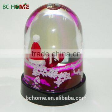 Plastic snow globe with photo insert