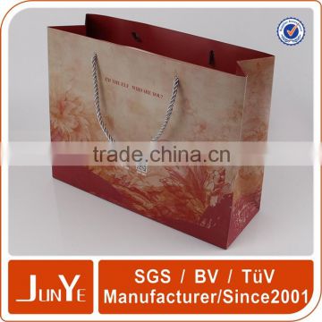 promotional paper carry shopping packaging bags in clothes