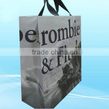Gray paper shopping bag with logo