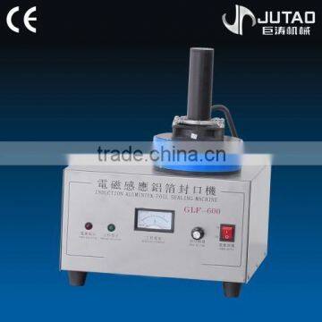 Good quality manual inductor aluminum foil sealing machine