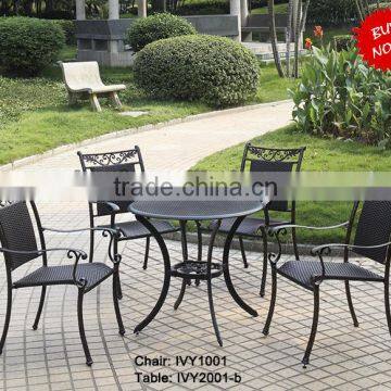 Foshan outdoor wicker chairs garden dining set round metal table for sale