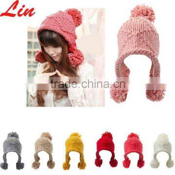 pink winter hats with pom poms