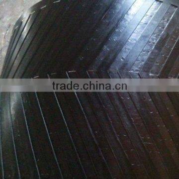 Ribbed conveyor belt with high performance