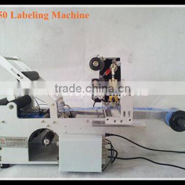 High-speed horizontal round bottle labeling machine with date coding