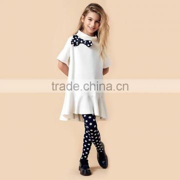 White long autumn girl dress with bow decoration