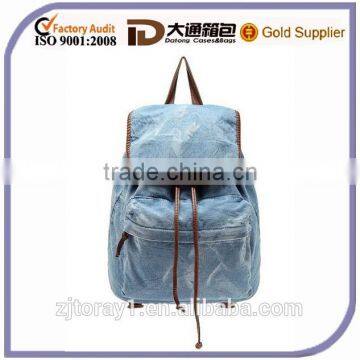 Light Blue waxed canvas backpack with string for student