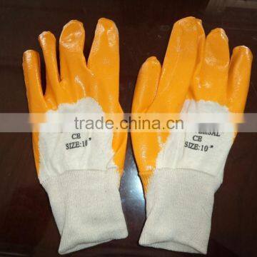 Cheap price high quality yellow nitrile coated interlock gloves for Turkey market                        
                                                Quality Choice