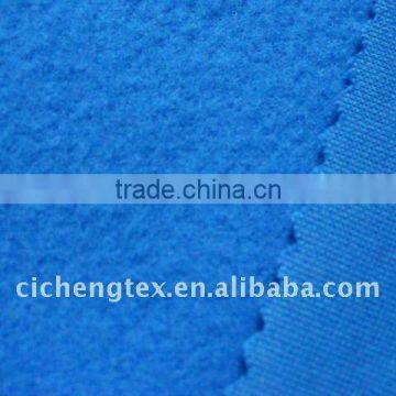 100%polyester interlock fabric, solid dyed, back brushed