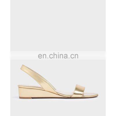 Golden color beautiful design and very attractive low heels wedge back elastic strap sandals shoes for ladies