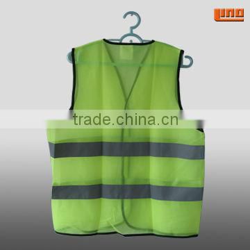 high visibility yellow safety vest with reflective tape