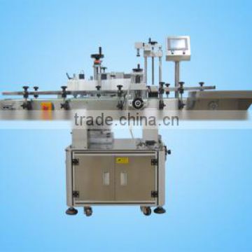 Positional round bottle labeling machine