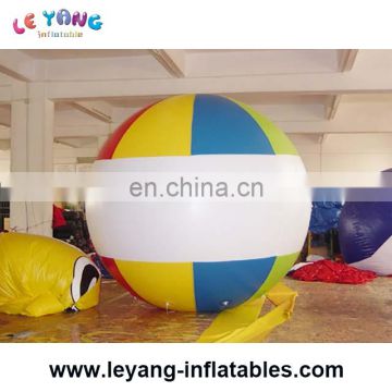 Colorful giant inflatable helium beach baseball balloon fly in the sky for events