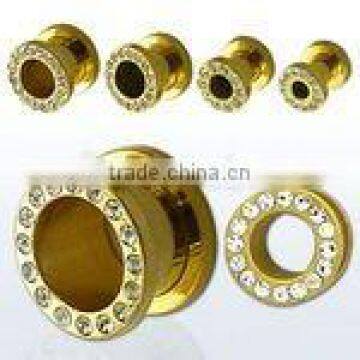 Gold anodized steel flesh tunnel plug with crystals