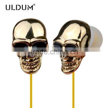 ULDUM brand cartoon novelty promotion gift skull earphone fashion stereo headphone wholesale skull earbuds