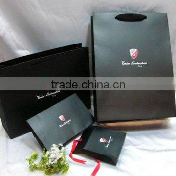 new design wholesale cheap paper shopping bags with your own logo