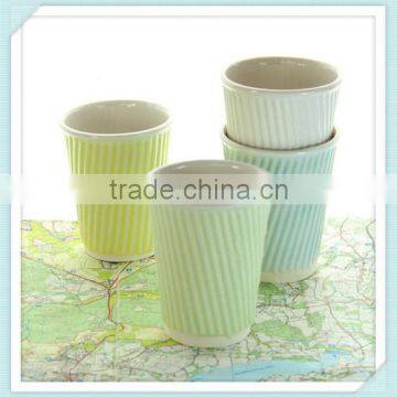 ceramic travel mug with lid. White porcelain cups. Ceramic travel cups for use as a tea cup, coffee cup