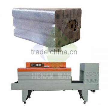 Hot shrink film packing machine for wood charcoal briquette