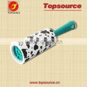 Green handle lint roller