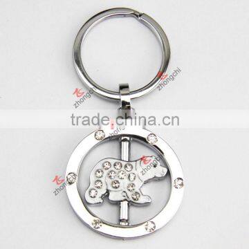 Rotating polar bear metal keychain