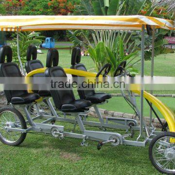 Public renting 4 person quadricycle tandem bike