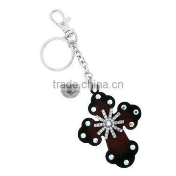 Brown cross keyring accented by spur fashion cross keychain